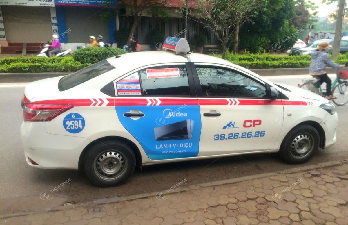 Quảng cáo Điều hòa Midea trên cửa xe taxi Group tại Hà Nội