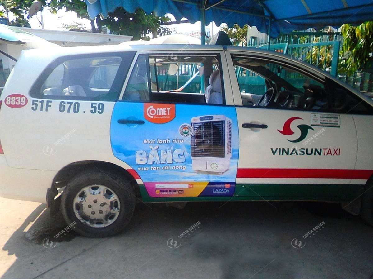 Thiết bị làm mát Comet quảng cáo trên taxi VinaSun tại TP Hồ Chí Minh