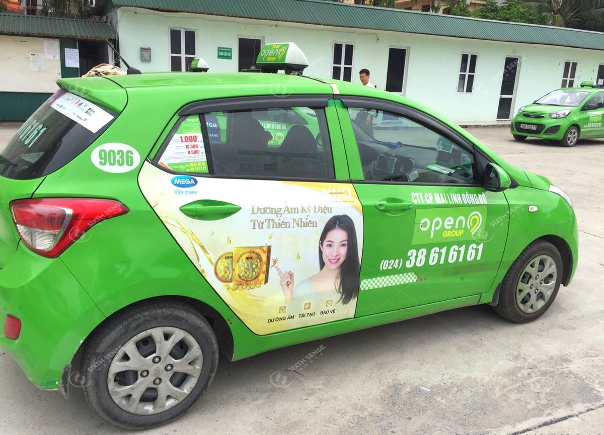 Mega We Care quảng cáo trên xe taxi Open99 Hà Nội năm 2018