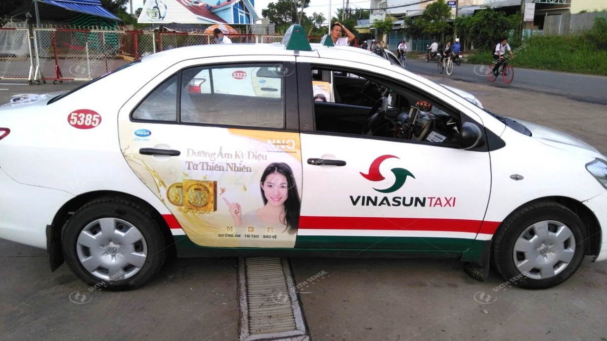 Mega We Care quảng cáo trên xe taxi Vinasun Cà Mau ăm 2018